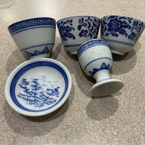 Collection of blue and white saki or tea cups sauce dish egg cup
